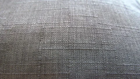 Close up of grey fabric with rough texture sliding sideway Stock Footage 149112825