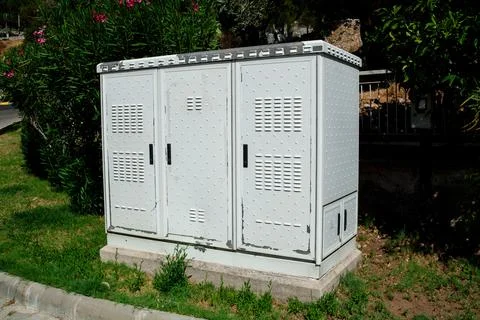 Close up Grey Hinged Power Supply Box on the street. Outside electrical box. Stock Photos