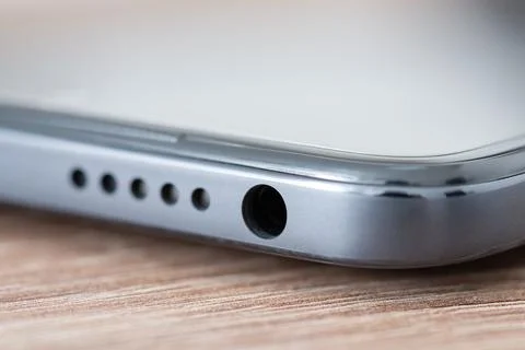 Close up of grey modern phone on the table Stock Photos