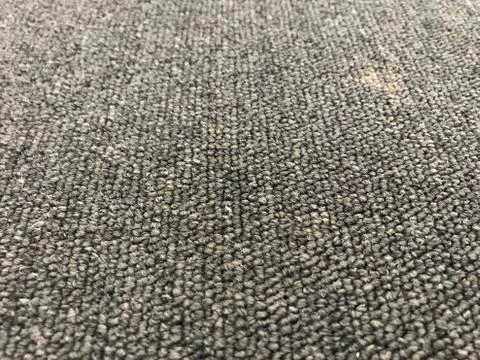 Close up grey old carpet with texture background Stock Photos