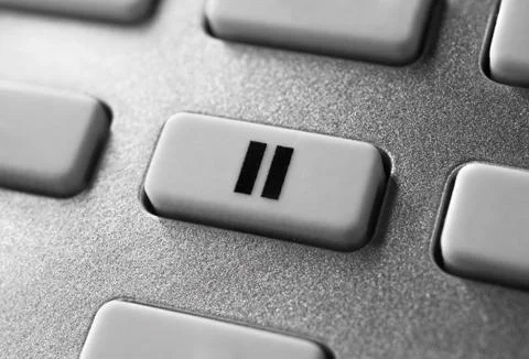Close Up Of A Grey Pause Button On Chrome Remote Control For A Hifi Stereo Au Stock Photos