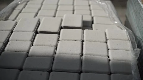 A close-up of grey paving slabs with blurred backgrounds. Copy space Stock Footage 200869443