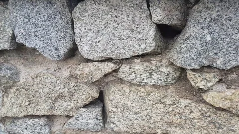 Close-up of grey stone wall Vídeos de archivo 97207126