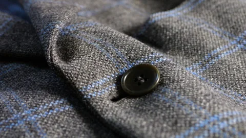 Close-up of a grey tweed woolen jacket lapel showing the fine lining material. Vídeos de archivo 346183283