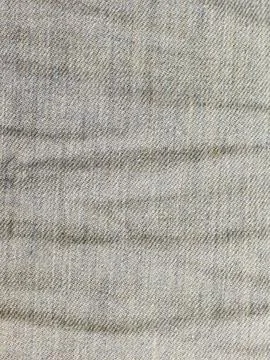 Close up of grey wool fabric texture with subtle pattern 写真素材