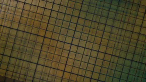 Close-up of a grid pattern with abstract yellow and green colors, abstract .. Stock Footage 348413388