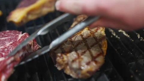 A close up of a grill with meat on it Stock Footage 301517172