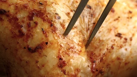 Close-up of grilled chicken with a fork Video stock 104974676