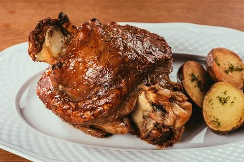 Close grilled meat bone potatoes Stock Photos