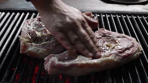 Close-up of the grilled meat steak cooking process 스톡 동영상 280395646