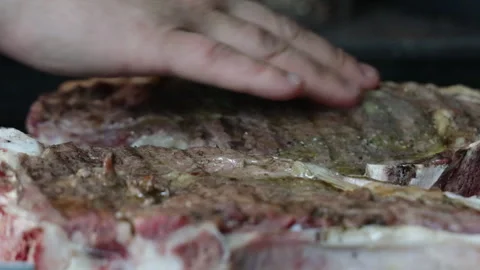 Close-up of the grilled meat steak cooking process 스톡 동영상 280401616