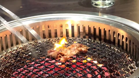 Close up of a grilling a bbq meat at restaurant FHD Footage Stock Footage 257872146