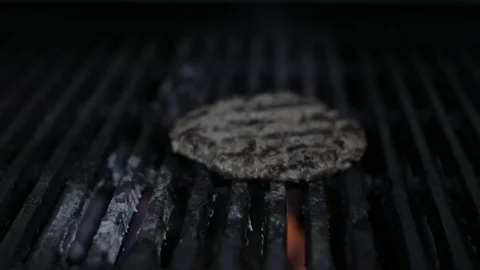 Close Up of Grilling Meat Burger Stock Footage 128462676