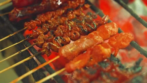 Close-up Grilling Pork BBQ Chicken Intestines Apr 17 2026 Cebu City Philippines Stock Footage 334704550