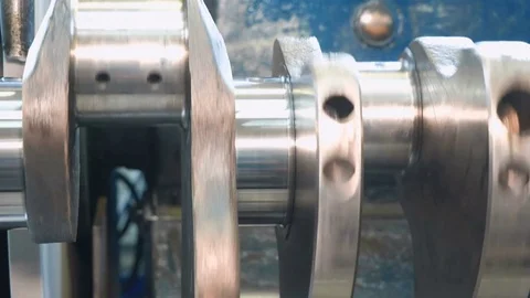 Close up of grinding of crankshaft on a grinding machine. Stock Footage 81540327