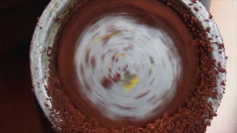 Close-up of the grinding process on the kitchen device with rotational movements Stock Footage 143376389