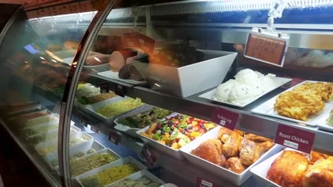 Close-up of a grocery store. dishes are preserved in glass cabinets Stock Footage 172050192