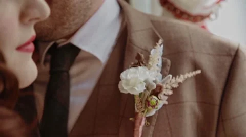 Close-up groom accessory Stock Footage 61774257