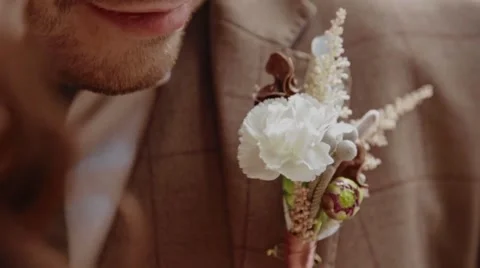 Close-up groom accessory slowmotion Stock Footage 61774262