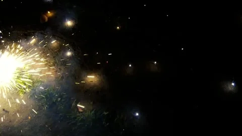 Close-up of a Ground Firecracker Ignition and Sparks. Nighttime Firecracker Vídeos de archivo 308387436