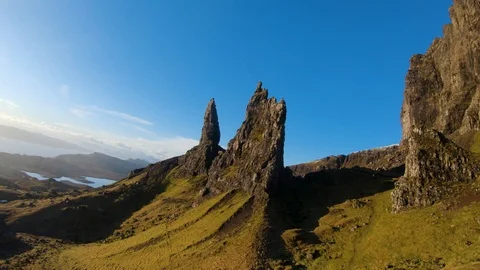 Close to the ground fly towards rock formations, Scotland drone aerial 4K Stock Footage 104578032