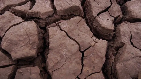 Close-up on the ground was dry from lack of moisture from the water Stock Footage 113208627
