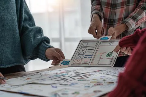 Close up group of asian creative team programing designers participate in all Stock Photos