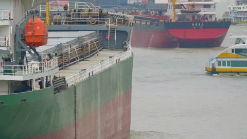 Close up of group of big cargo ships sailing on Huangpu river Stock Footage 134584340