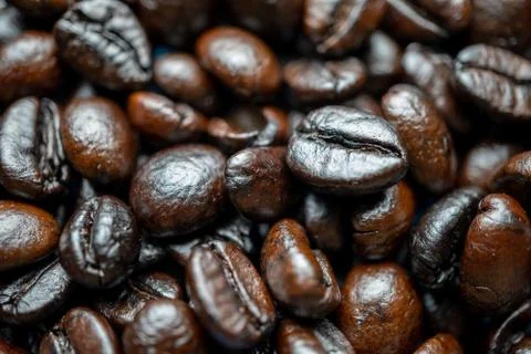 Close up of group black coffee beans. Strong black espresso, Grains of coffee Foto stock