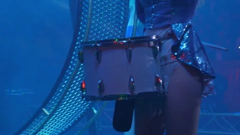 A close-up of a group of female drummers performing in the circus arena. Stock Footage 310655742