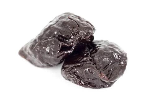 Close up group of prunes on white background Stock Photos