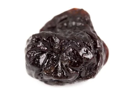 Close up group of prunes on white background Stock Photos