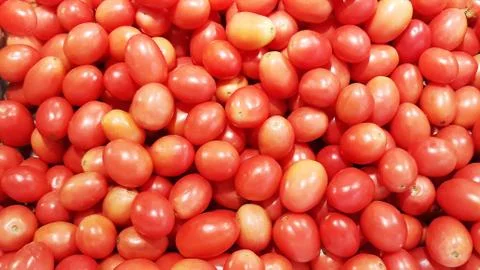 Close up group of stacked tomatoes Stock Photos
