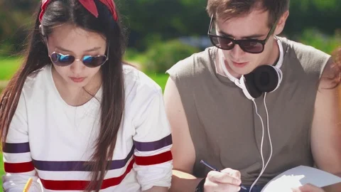 Close-up of group of students preparing for test together Stock Footage 93242722