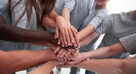 Close up. a group of young people showing their unity Stock Photos