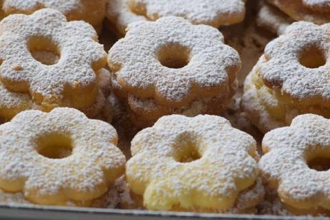 Close up of groups of canestrelli biscuits covered with icing sugar Stock Photos