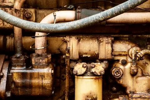 Close up of grungy old combustion engine from vintage tractor 스톡 사진