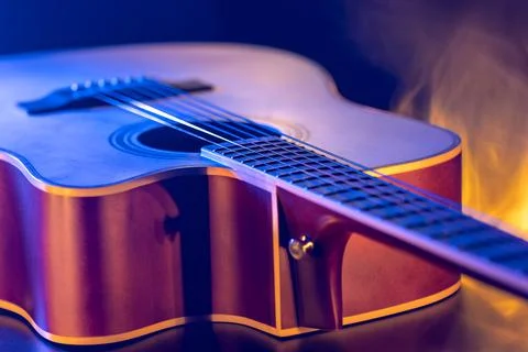 Close up of guitar and strings with shallow depth of field, soft focus. Stock Photos