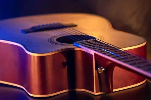Close up of guitar and strings with shallow depth of field, soft focus. Stock Photos