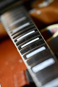 Close-up of Guitar Fretboard with Rectangular Inlays Stock Photos