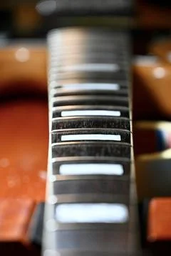 Close-up of Guitar Fretboard with Rectangular Inlays Stock Photos