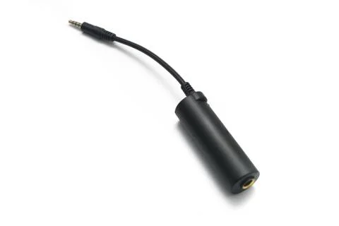 Close up guitar interface adapter for smartphone and tablet Stock Photos