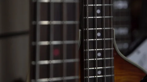Close-up of guitar necks 스톡 동영상 125990434