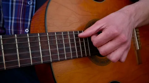 Close up of guitar play Stock Footage 82213714
