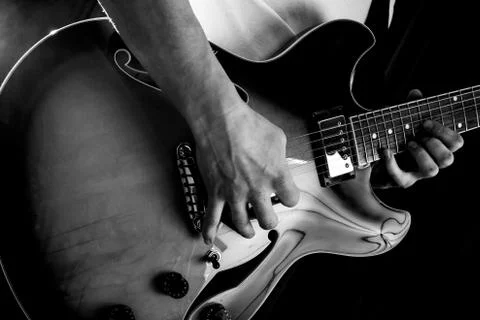 Close up of a guitar player Stock Photos