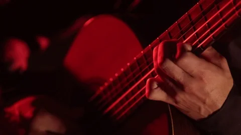 Close-up of guitar strings and fretboard,man playing an acoustic guitar,isolated Stock Footage 121583839