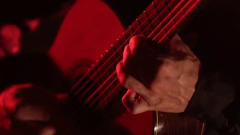 Close-up of guitar strings and fretboard,man playing an acoustic guitar,isolated Stock Footage 121583843