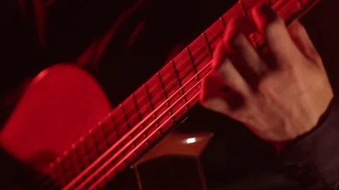 Close-up of guitar strings and fretboard,man playing an acoustic guitar,isolated Stock Footage 121583858