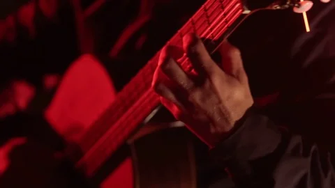 Close-up of guitar strings and fretboard,man playing an acoustic guitar,isolated Stock Footage 121583860