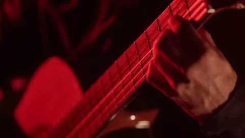 Close-up of guitar strings and fretboard,man playing an acoustic guitar,isolated Stock Footage 121583867
